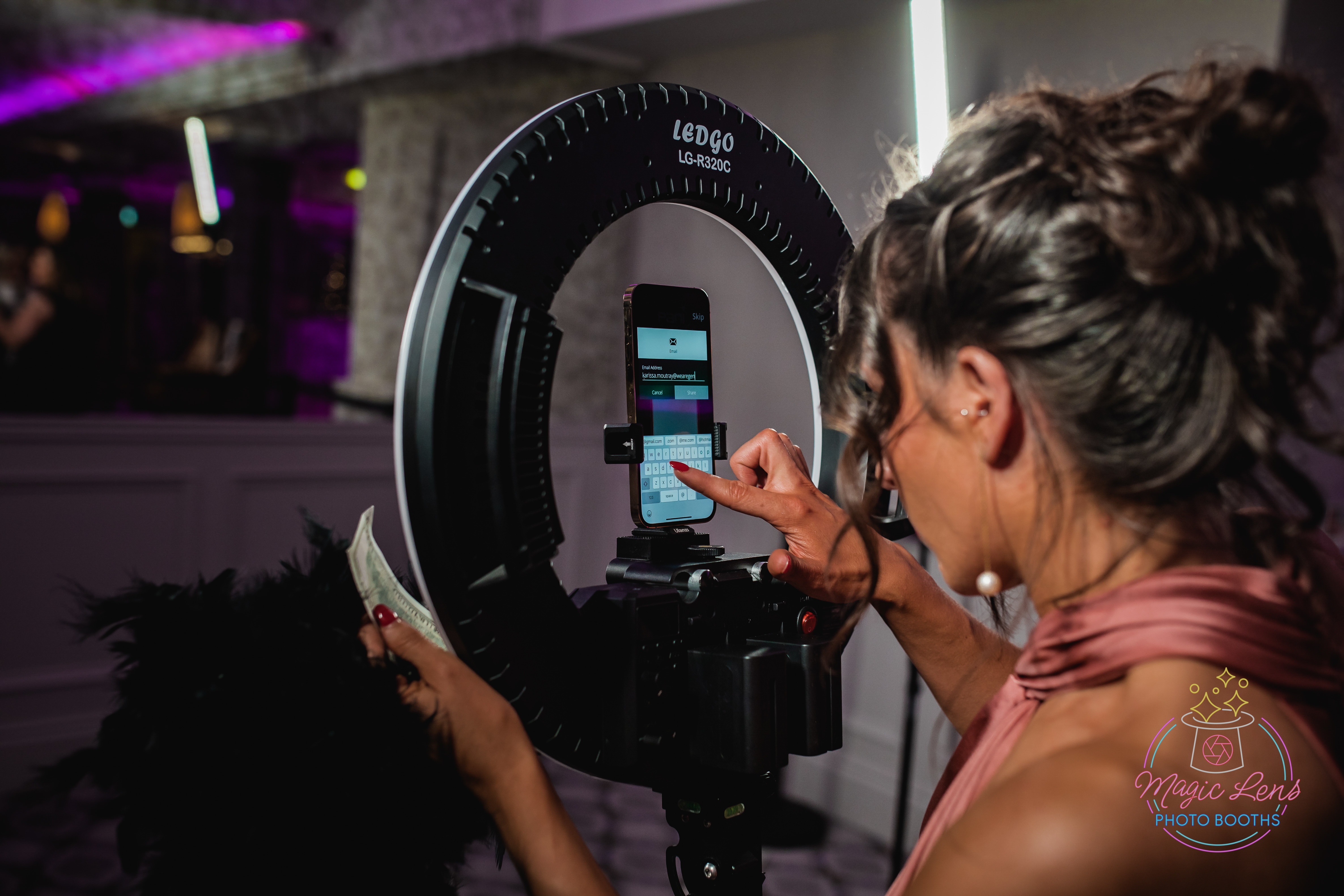 A lovely lady adding her details to the 360 to receive her photos